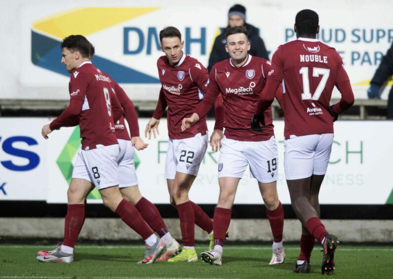 The Arbroath players celebrate a goal in their recent 3-0 win over Dunfermline.