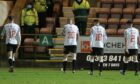 Dejected: Dunfermline players
