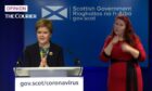 First Minister Nicola Sturgeon has called for people to defer Christmas parties as part of measures to control the spread of the Omicron variant.