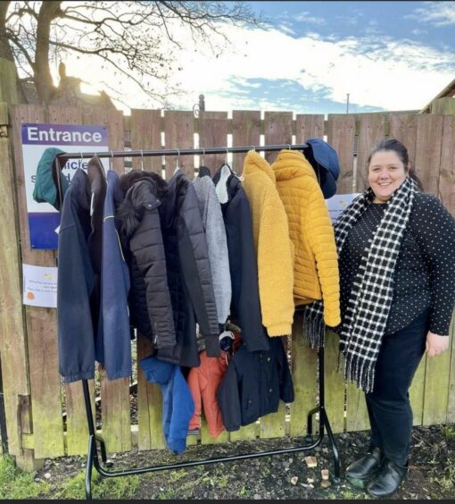 Caroline with the coats from the nursery winter jacket initiative.