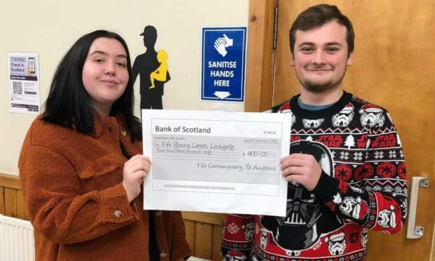 Members of Fife Young Carers receiving the cheque for both youth groups