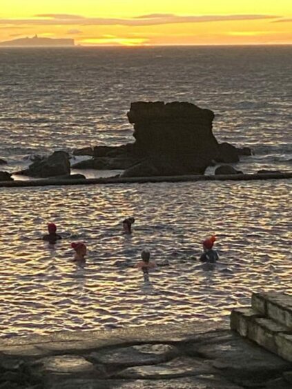 Wild swimming in the East Neuk involves wonderful views of the Isle of May.