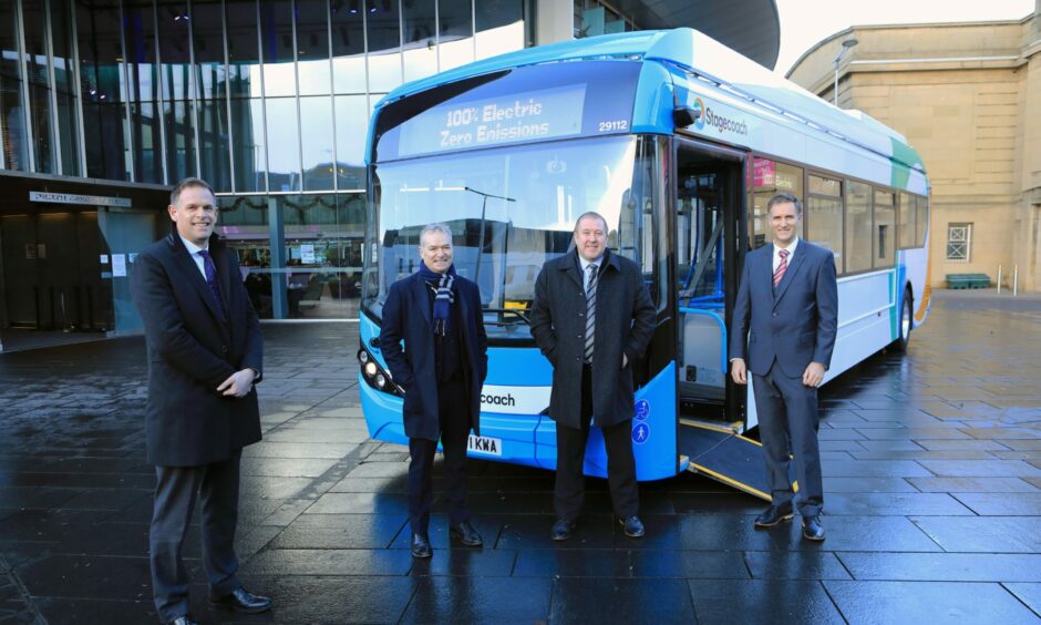 Paul Davies, Alexander Dennis; Martin Griffiths, Stagecoach chief executive; former transport minister Graeme Dey and Sam Greer, Stagecoach regional director.