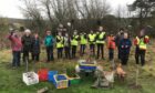 'Thursday Scouts' from 10th Fife 1st Cupar Scout Group joined Cupar in Bloom members to help Sustainable Cupar volunteers plant trees near the old curling pond close to the banks of the River Eden in Cupar.