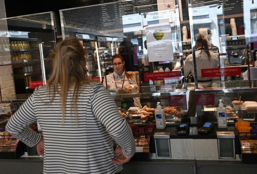 The powers that be want us to return to the office... so sandwich shops can get their lunchtime rush on. Photo by Neil Hall.