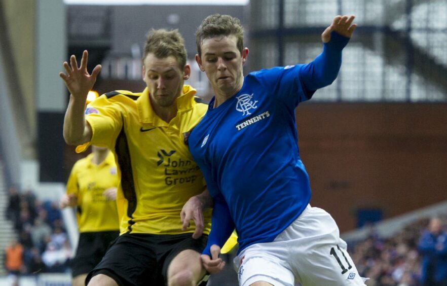 Boyle tussles with David Templeton in when Montrose took on Rangers at Ibrox in 2013.