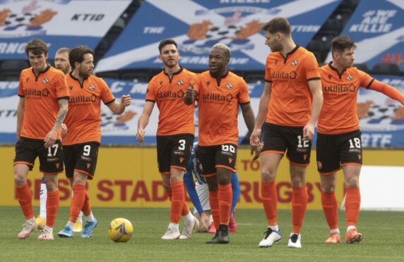 Dundee United's Adrian Sporle celebrates with his team mates in a game against Kilmarnock last season.