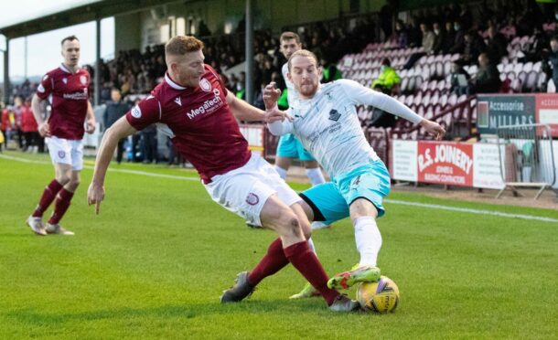 Arbroath's Jason Thomson (left) is back fit but may have to wait to for his chance.