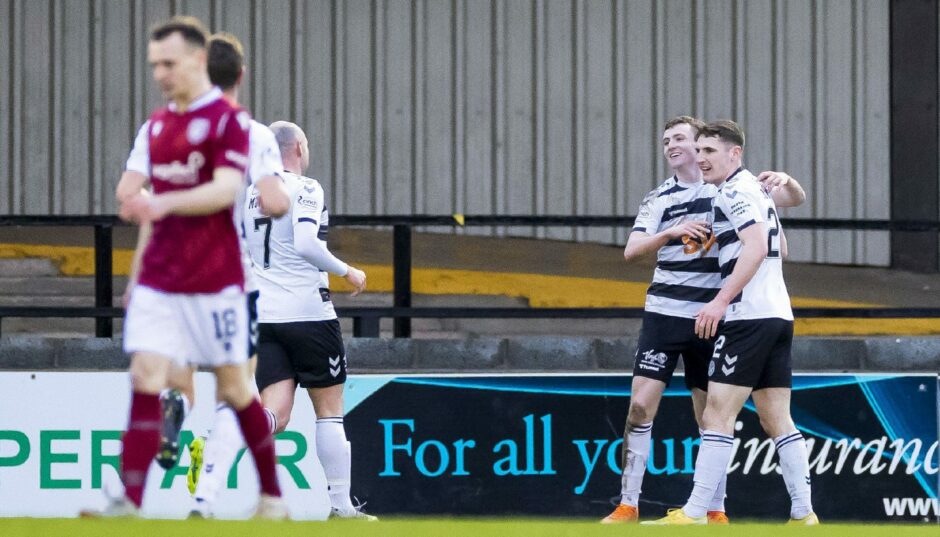 Ayr's James Maxwell (centre) celebrates making it 1-0 with his teammates