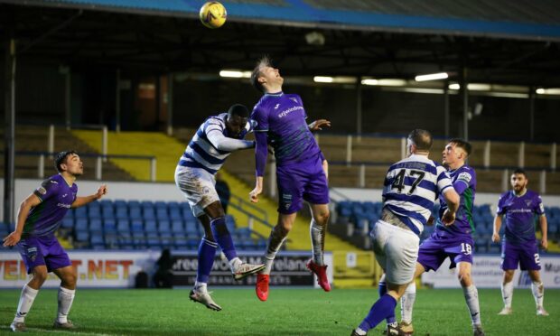 Coll Donaldson heads into his own net