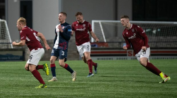 Nicky Low celebrates completing Arbroath's comeback against Raith Rovers