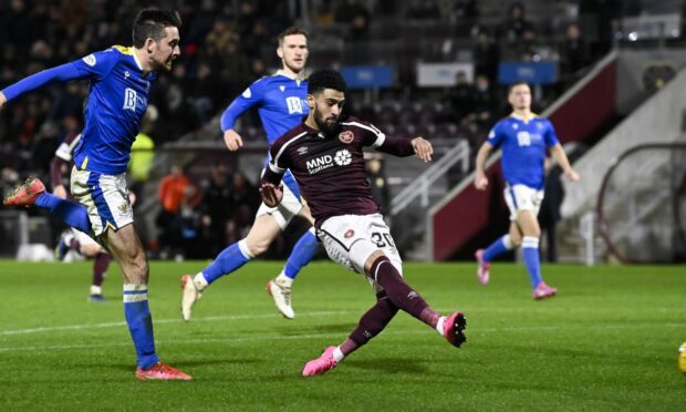 Josh Ginnelly scores to make it 1-0 for Hearts.