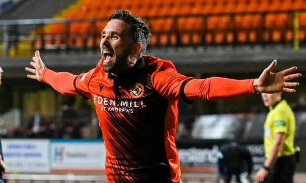 Nicky Clark celebrates his winner against Ross County.