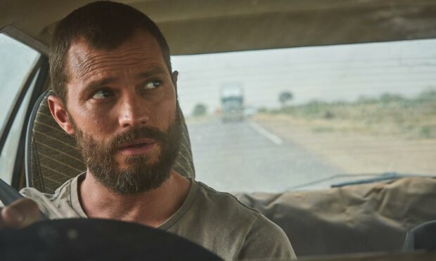 The Man (Jamie Dornan) in The Tourist.