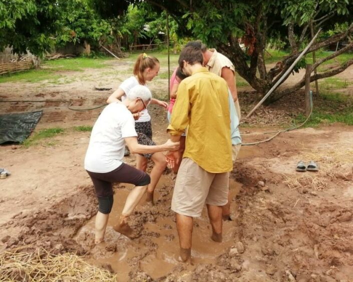 In Thailand, Alicia took part in a natural building course where she lived in a mud hut.