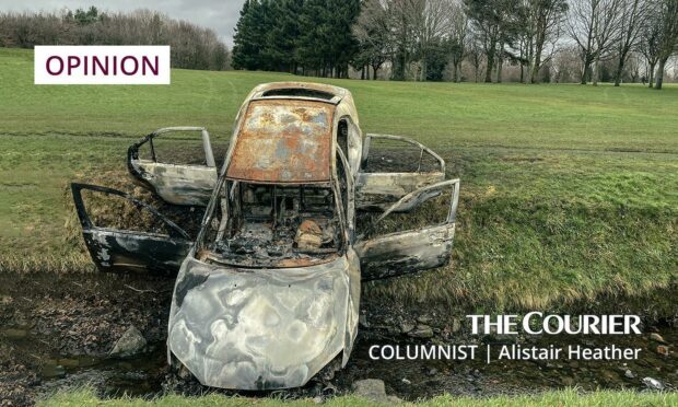 A burnt-out car on the edge of Dundee. Surely the city deserves better than this?