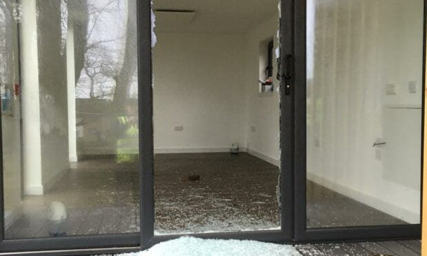 A smashed window at Fintry Nursery.