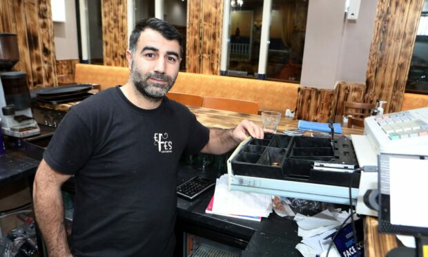 Efe's cafe owner Bylal Tugrul.