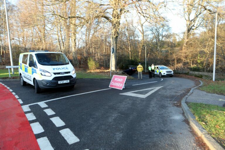Driver escapes unscathed after car flips on roof in Dundee crash