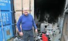 Facilities manager Danny McGregor checks the damage caused by the fire at Fairfield Sports and Social Club.