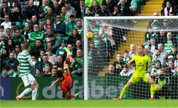 Harkes beats Joe Hart with a superb header. Image: SNS