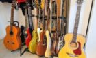 Rab's beloved guitar collection, all the better for him talking to them.