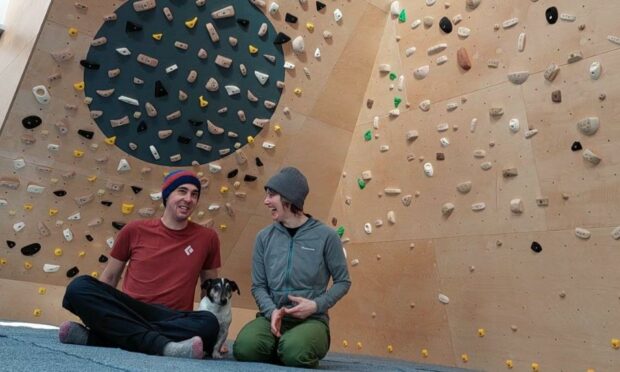 In Situ Climbing owner Alison Annison with James Coutie and Rockstar the dog.