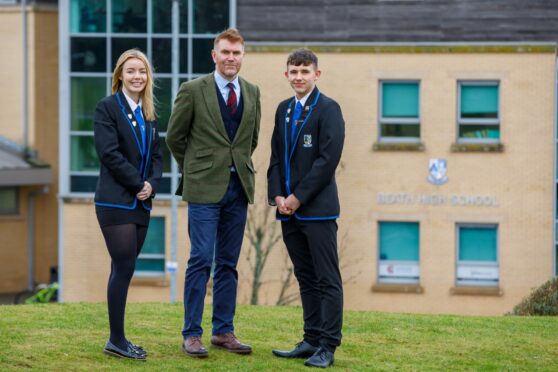 Beath High School ambition to be among the best in Scotland. Picture shows head teacher Steve Ross with head boy and head girl