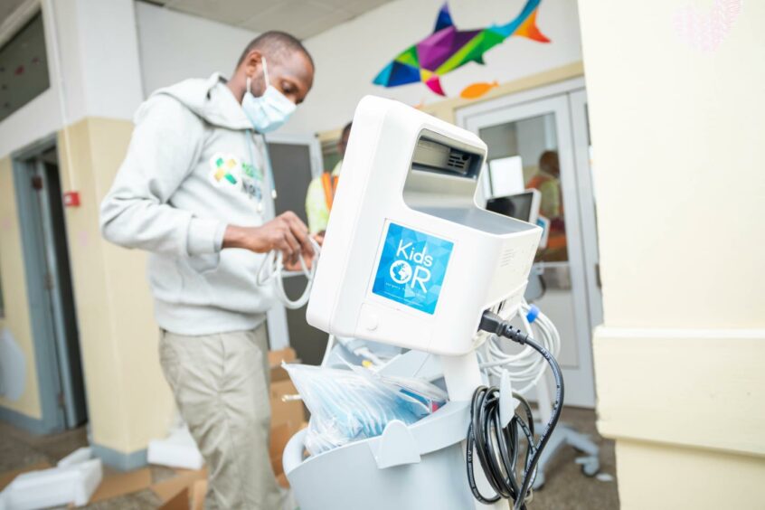 Hospital staff help install the new machines.