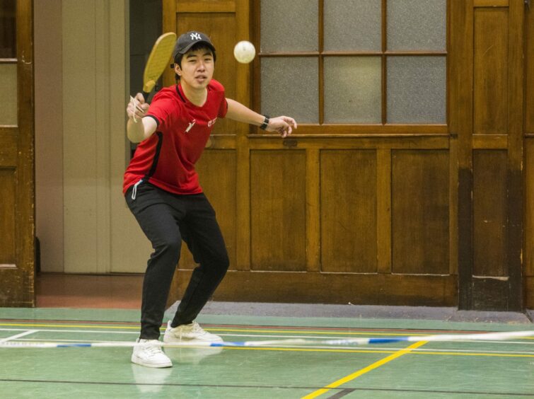 Pickleball is played with a bat that looks like a larger table tennis bat.