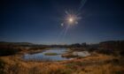 A full moon over one of the lochs at Murton Nature Reserve near Forfar. Picture: Steve MacDougall.
