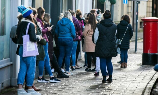 The queue on Saturday morning outside Ivory Whites.