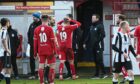 Max Kucheriavyi (19) walks past boss Andy Kirk as he was sent off with Brechin leading 3-1.