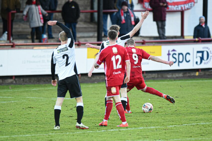 Garry Wood scores to put Brechin 3-0 up against Fraserburgh, before The Broch fought back to win 5-3.