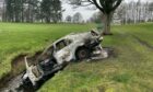 A torched car at Dundee's Caird Park.