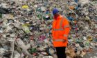 Councillor Jonny Tepp with some of Fife's waste plastic mountain