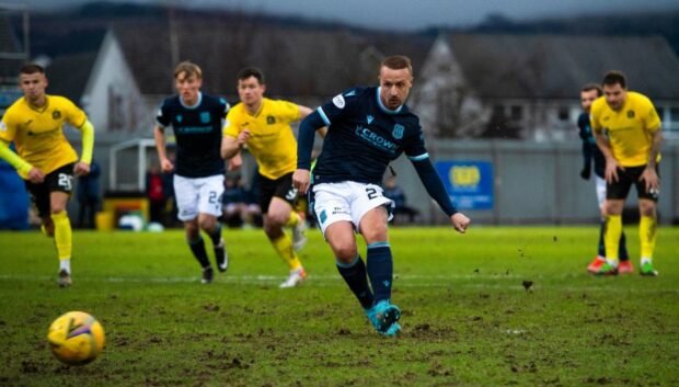 Dundee striker Leigh Griffiths scores from the spot against Dumbarton.