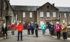 Brechin Healthcare Group members outside the infirmary at the height of their campaign. Image: Mhairi Edwards/DCT Media