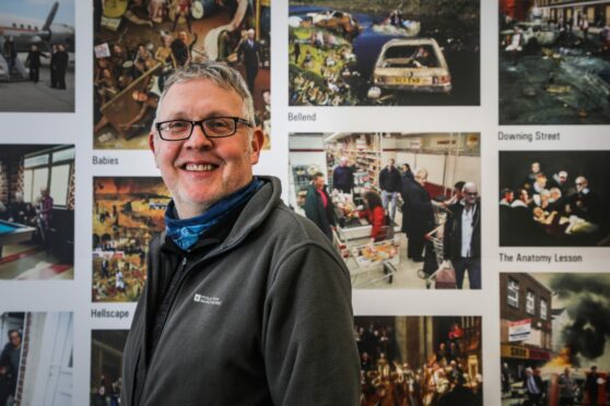 Organiser Ewen Campbell with the Cold War Steve exhibition at Kinghorn Community Library. Pic: Mhairi Edwards/DCT Media.