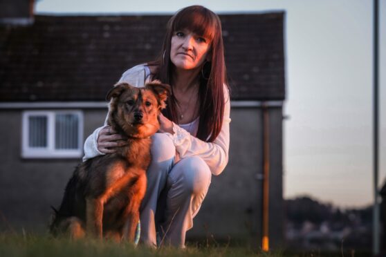 Simone Smith and her pet, Mack were attacked with stones.
