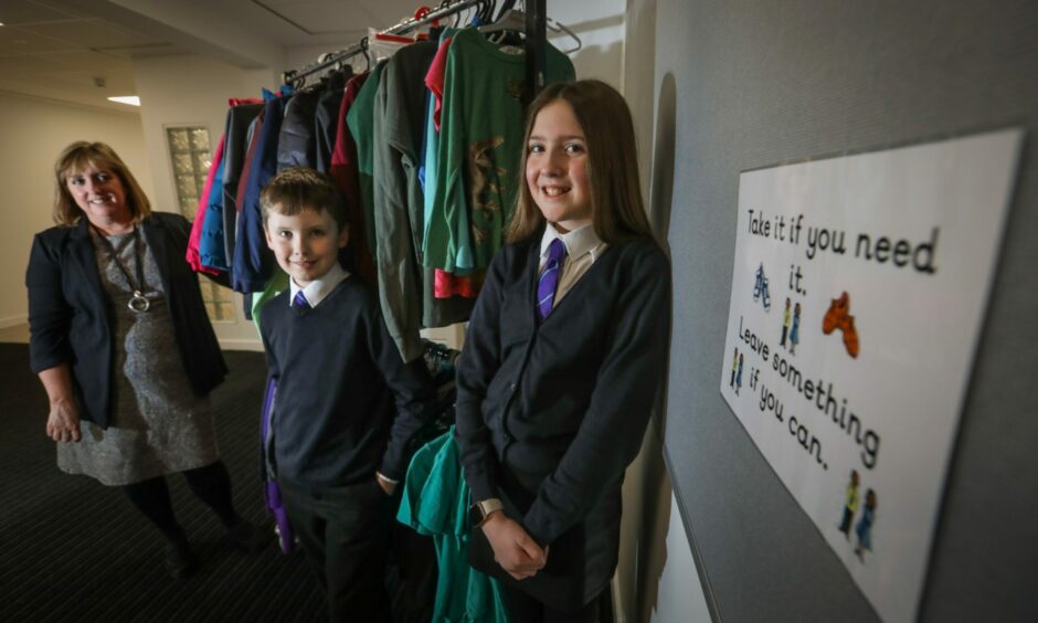 Vivienne Snee, head teacher of Mill of Mains Primary School, with pupils Fraser Melville, P6, and Ava Whyte, P7.