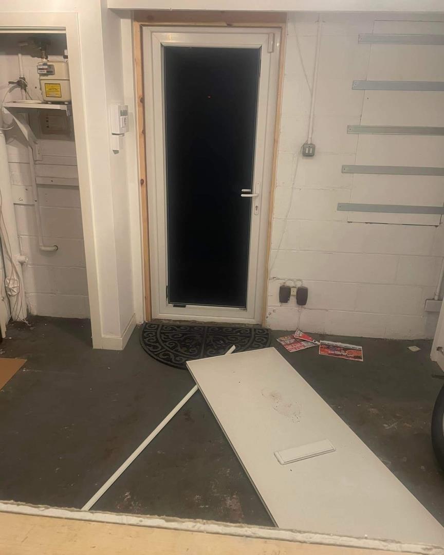 The broken-down door at the Fife mortuary after the break-in.