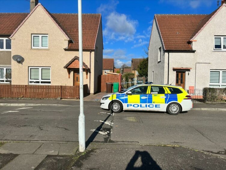 Police guard Veronica Crescent in Kirkcaldy where a man was found injured