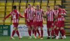 St Johnstone players celebrate at Livingston. Supplied by SNS