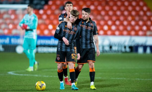 Rory MacLeod, left, with Marc McNulty after making his debut in February
