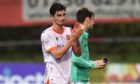 Ian Harkes applauds Dundee United fans after the win over Partick Thistle