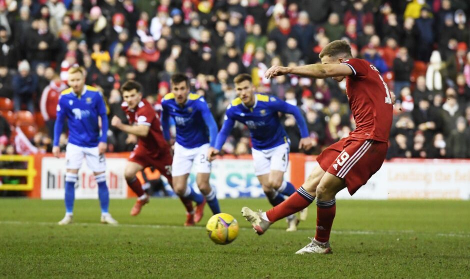Aberdeen's Lewis Ferguson makes it 1-1 from the penalty spot.