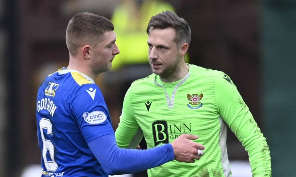 Elliott Parish celebrates at full-time with Liam Gordon.