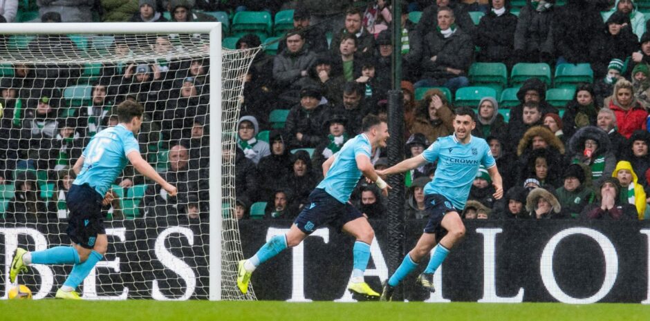 Danny Mullen celebrates after opening the scoring against Celtic