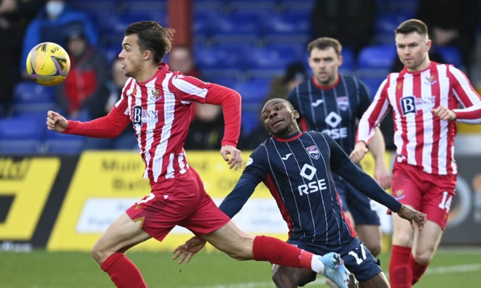 Tom Sang in action against Ross County.